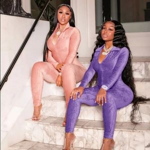 PURPLE JUMPSUIT SIZES SMALL AND MEDIUM AVAILABLE 95%POLYESTER 5% ELASTANE